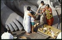 India, General, Jains worshipper poouring milk over Gomatesh Vara Statue Shravana Belagola Jain Puja.