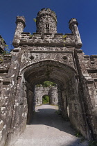 Ireland, County Waterford, Lismore, Ballysaggartmore Towers, main entrance gate to the former home of Anglo Irish Landlord Arthur Keily-Ussher.