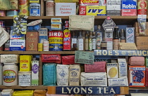 Ireland, County Roscommon, Curraghboy, Derryglad Folk and Heritage Museum, some typical items from a small shop of the 1960's displayed on shelves.