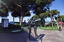 France, Provence-Alps, Cote d'Azur, Antibes Juan-les-Pins, Bronze statues of male and female figures embracing.