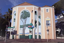 France, Provence-Alps, Cote d'Azur, Antibes Juan-les-Pins, Ornately painted building gable wall.