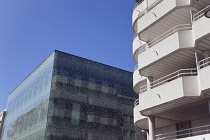 France, Provence-Alps, Cote d'Azur, Antibes, Modern glass fronted building in the old town.