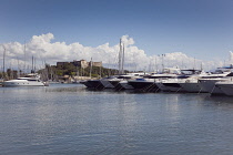 France, Provence-Alps, Cote d'Azur, Antibes, Yachts and motor cruisers moored in the marina.