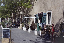 France, Provence-Alps, Cote d'Azur, Antibes, Art galleries in arches of old town walls.