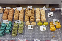 France, Provence-Alps, Cote d'Azur, Antibes, Provencal food market display of macarons.