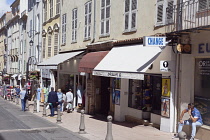 France, Provence-Alps, Cote d'Azur, Antibes, Busy shopping street in the old town.