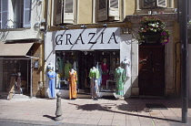 France, Provence-Alps, Cote d'Azur, Antibes, Clothes shop with manekins outside in the old town.