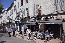 France, Provence-Alps, Cote d'Azur, Antibes, Busy brasserie on the corner of Place Nationale.