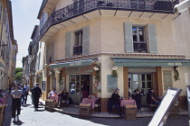 France, Provence-Alps, Cote d'Azur, Antibes, Tourists sat outside cafes and bars in the old town.