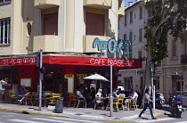 France, Provence-Alps, Cote d'Azur, Antibes, Locals sat outside cafe in the old town.