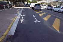 France, Provence-Alps, Cote d'Azur, Antibes Juan-les-Pins, Cycle lane with signs painted on the road.