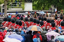 England, London, The Mall, Grenadier Guards marching during the coronation of Kings Charles III on a rainy May 6th 2023.