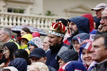 England, London, The Mall,  people celebrating the coronation of King Charles III on a rainy May 6th 2023.