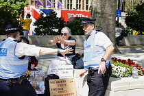 England, London, Westminster, Parliament Square, Protesters and Police Liason Officers in conversation.