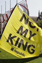 England, London, Westminster, Parliament Square, Anti Royal family protesters yellow flag.