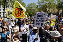 England, London, Westminster, Protesters marching outside Downing Street.