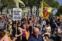 England, London, Westminster, Protesters marching outside Downing Street.