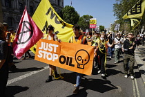 England, London, Westminster, Just Stop Oil protesters marching outside Downing Street.