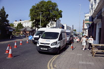 England, East Sussex, Brighton, Western Road, Traffic congestion caused by Gas company digging up the road.