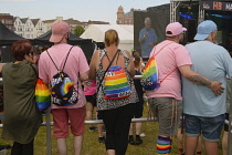 England, Hampshire, Portsmouth, Crowds gathered on the seafront lawns for Pride Celebrations, 10th June 2023.