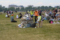 England, Hampshire, Portsmouth, Cleaners emptying bins on the seafront lawns for Pride Celebrations, 10th June 2023.