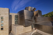 Spain, Basque Country, Bilbao, Rear of the Guggenheim Museum seen from Puente de la Salve.