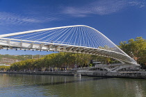 Spain, Basque Country, Bilbao, Zubizuri or White Bridge, tied arch footbridge across the Nervion River designed by Santiago Calatrava and opened in 1997.