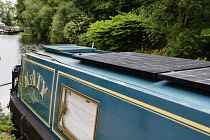 Energy, Power, Renewable, Solar panels on roof of canal barge to collect power for batteries.