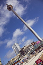 England, East Sussex, Brighton, Steel i360 observation tower on seafront promenade busy with summer tourists.