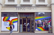 England, East Sussex, Brighton, Hove, Western Road, Exterior of Tesco Express convenience store decorated for Pride.
