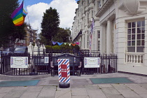 England, East Sussex, Brighton, Hove, Western Road, Entrance to Gwydr underground barber shop decorated with mutli coloured pants.