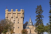 Spain, Castile and Leon, Segovia, 12th century Alcazar of Segovia with the 15th century Tower of John 2nd of Castile being the main feature, head on view from the Plaza de la Reina Victoria in front o...