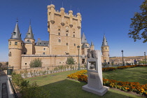 Spain, Castile and Leon, Segovia, 12th century Alcazar of Segovia with the 15th century Tower of John 2nd of Castile being the main feature, view from the left of the Plaza de la Reina Victoria in fro...