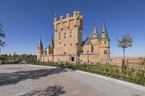 Spain, Castile and Leon, Segovia, 12th century Alcazar of Segovia with the 15th century Tower of John 2nd of Castile being the main feature, view from the right on the Plaza de la Reina Victoria in fr...