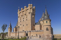 Spain, Castile and Leon, Segovia, 12th century Alcazar of Segovia with the 15th century Tower of John 2nd of Castile being the main feature, close up view from the right on the Plaza de la Reina Victo...