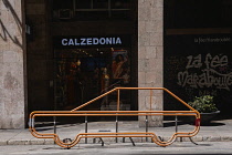 Spain, Balearic Islands, Majorca, Palma de Mallorca, outline of a car in metal piping in a parking bay on the street.