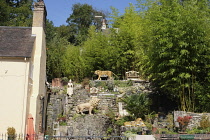 England, Shropshire, Ironbridge, Garden with many animal statues.