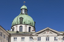 Austria, Tyrol, Innsbruck, Dome of the Dom zu St Jakob or Cathedral of St James rising above the Hofburg Imperial Palace.