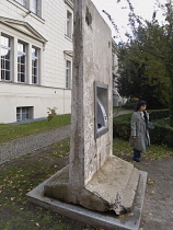 Germany, Berlin, Hamburger Bahnhof former railway station now acontemporary art museum, the Museum für Gegenwart. Section of Berlin Wall with ATM cash machine.