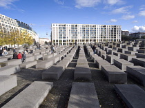 Germany, Berlin, Mitte, Holocaust Memorial designed by US architect Peter Eisenmann with a field of of grey slabs symbolising the millions of Jews killed by the Nazis.