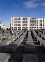 Germany, Berlin, Mitte, Holocaust Memorial designed by US architect Peter Eisenmann with a field of of grey slabs symbolising the millions of Jews killed by the Nazis.