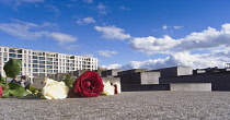 Germany, Berlin, Mitte, Holocaust Memorial designed by US architect Peter Eisenmann with a field of of grey slabs symbolising the millions of Jews killed by the Nazis.