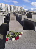 Germany, Berlin, Mitte, Holocaust Memorial designed by US architect Peter Eisenmann with a field of of grey slabs symbolising the millions of Jews killed by the Nazis.