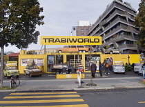 Germany, Berlin, Mitte, Exterior of Trabi World on Zimmerstrasse offering city tours in old Trabant 2 stroke cars.