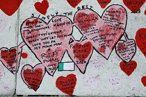 England, London, Westminster, UK, 3rd October 2023. The National Covid Memorial Wall. Public mural on the South Bank of the River Thames, with over 230,00 pink and red hearts.