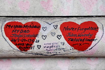 England, London, Westminster, UK, 3rd October 2023. The National Covid Memorial Wall. Public mural on the South Bank of the River Thames, with over 230,00 pink and red hearts.