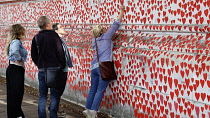 England, London, Westminster, UK, 3rd October 2023. The National Covid Memorial Wall. Public mural on the South Bank of the River Thames, with over 230,00 pink and red hearts.