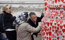 England, London, Westminster, UK, 3rd October 2023. The National Covid Memorial Wall. Public mural on the South Bank of the River Thames, with over 230,00 pink and red hearts.