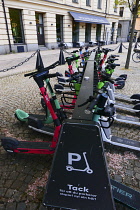 Sweden, Stockholm, E-scooters for hire.