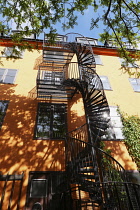 Sweden, Stockholm, The Old Town spiral fire escape from apartments.